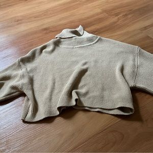 Beige turtleneck cropped sweater from the H&M “Divided Brand” in a size large